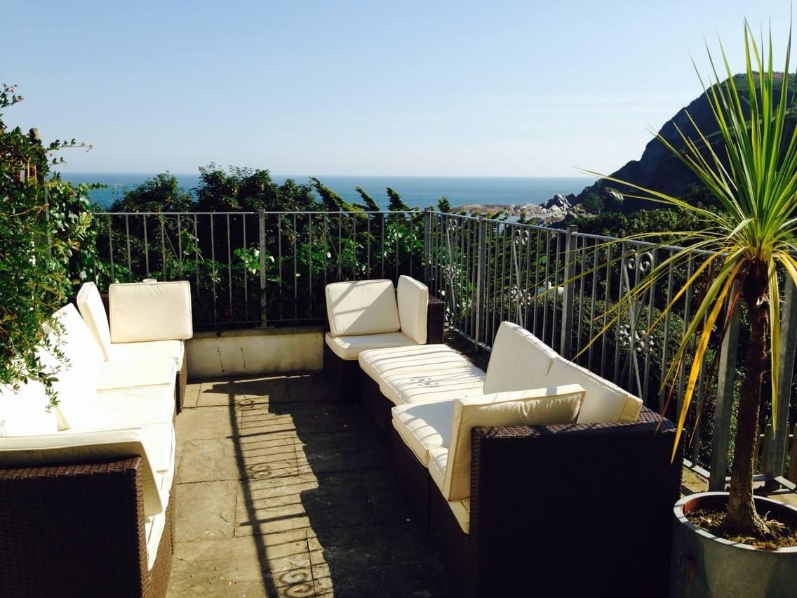 Big Sea House garden coffee area with great views